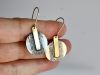 Boucles Lumy 10 A0288413 E18B 4400 840F 5058066054C9 1 201 a scaled 49469b8a